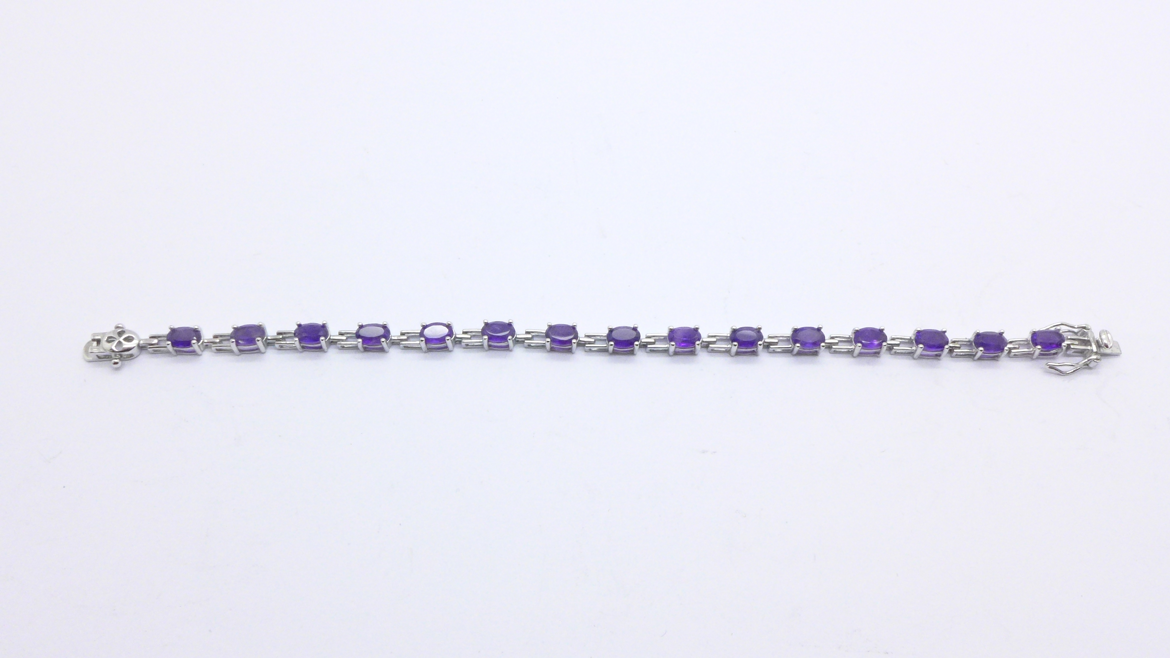 An amethyst and silver bracelet in original box