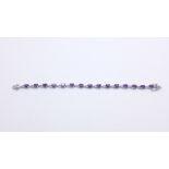 An amethyst and silver bracelet in original box