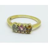 A silver gilt multicolour tourmaline trilogy ring, J