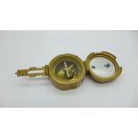 A reproduction Stanley London brass compass
