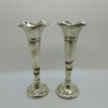 A pair of silver vases, Chester 1908, 188g, weighted bases