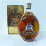A bottle of Dimple 12 Years Old Scotch Whisky, boxed