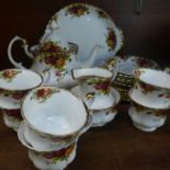 A Royal Albert Old Country Roses tea service comprising; a teapot, sugar bowl, milk jug, six cups,
