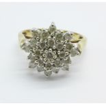 A 9ct gold diamond cluster ring, approximately .85 ct, 4.9g, S