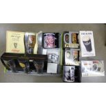 Two Marilyn Monroe mugs, a Zippo lighter, a belt buckle, a collection of Guinness mugs and six