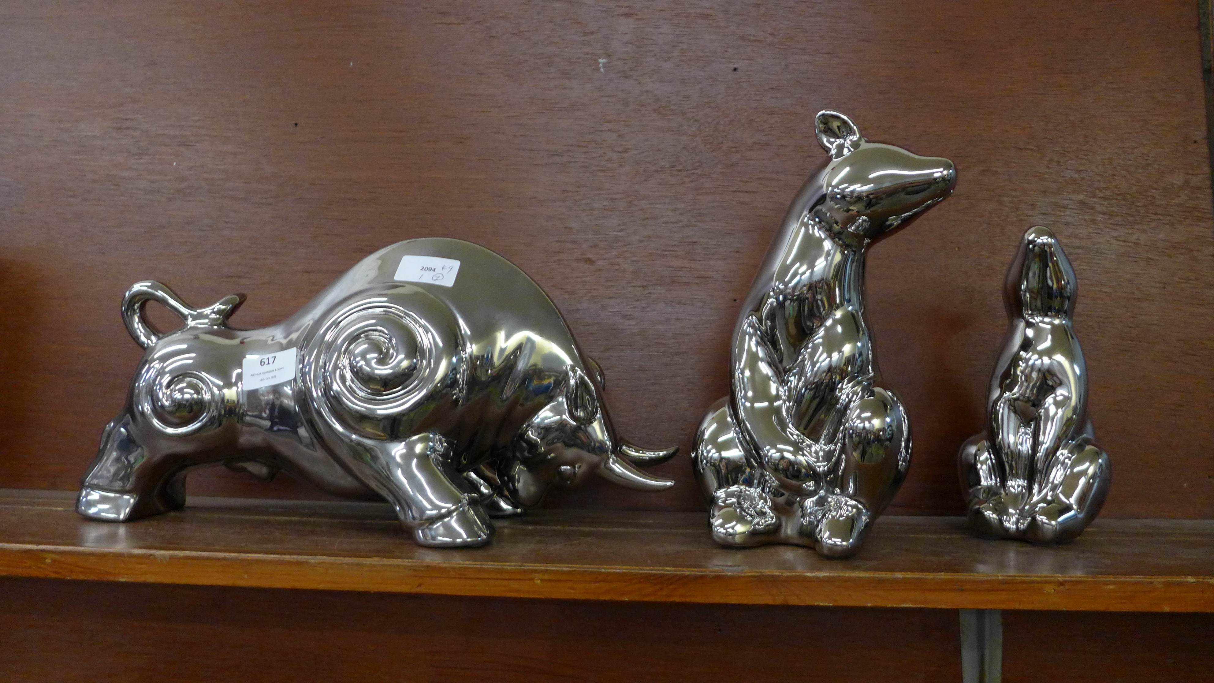 Three pottery and chrome finish animals; two bears and a bull