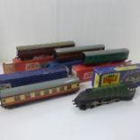 A Hornby Dublo steam locomotive Golden Fleece 4-6-2 and four Hornby Dublo railway coaches, boxed and
