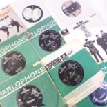 Twenty-five Beatles and Beatles solo 7" vinyl singles and EP's