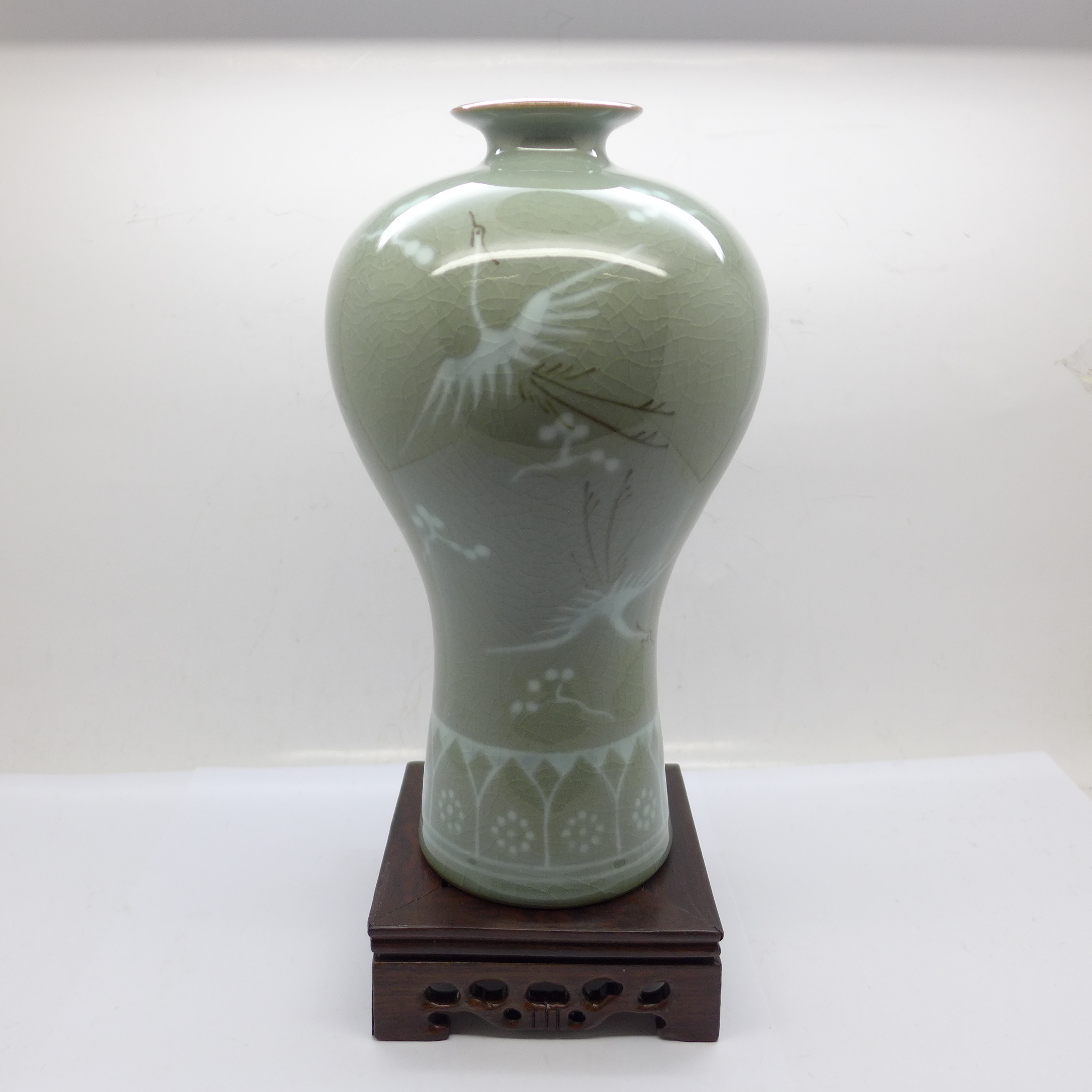 A Chinese modern Celadon vase, base marked with Ningbo University stamp, 22cm, boxed