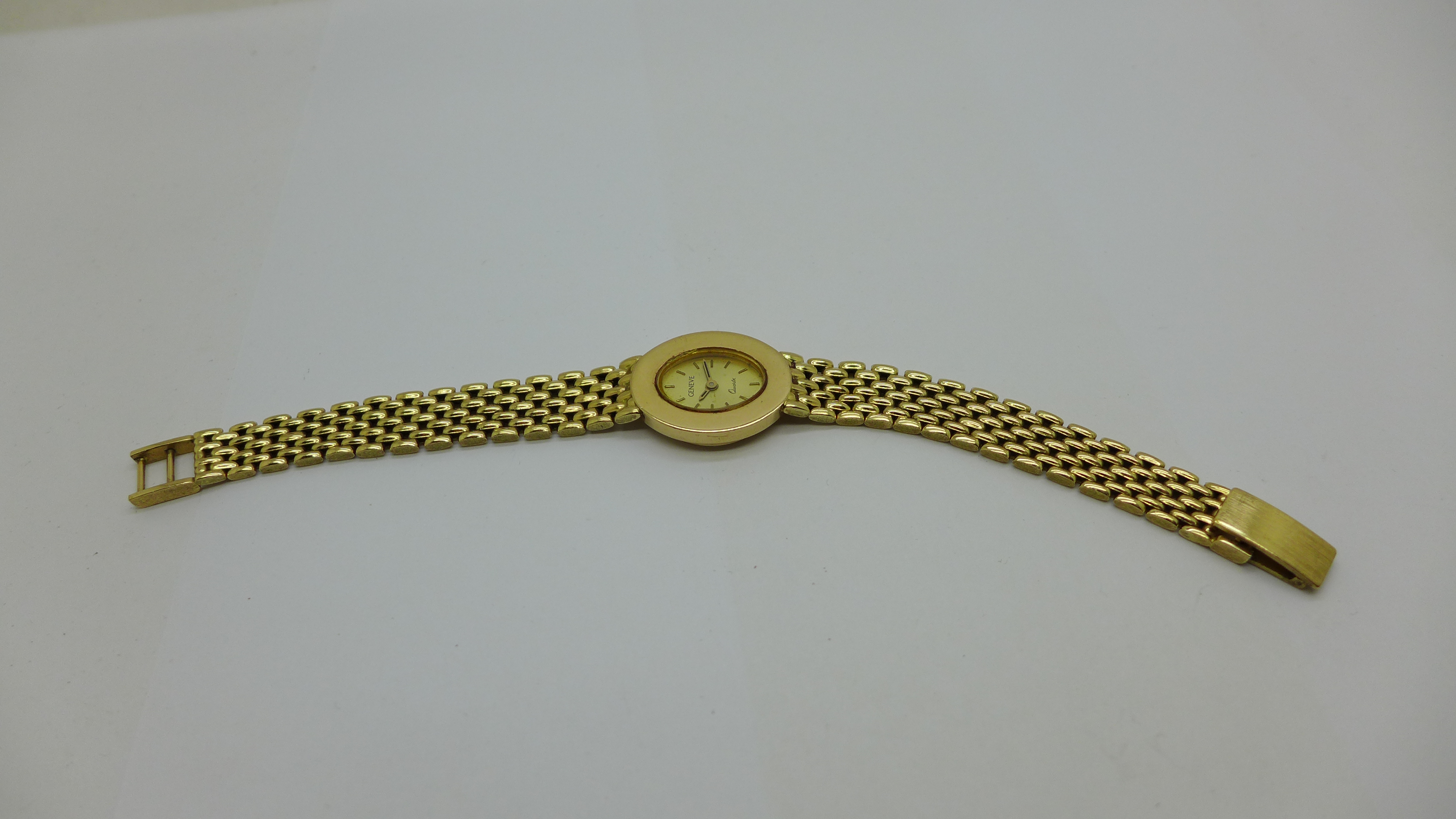 A lady's Geneve quartz 14ct gold wristwatch, 36g gross - Image 3 of 6