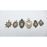 Six silver fobs, 54g