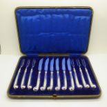 A set of six silver cheese knives and pickle forks with pistol grip handles, Asprey and Co.,