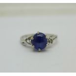 A 14k white gold and blue stone ring, 2.8g, O