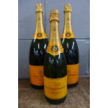 Three Veuve Clicquot specimen bottles of champagne
