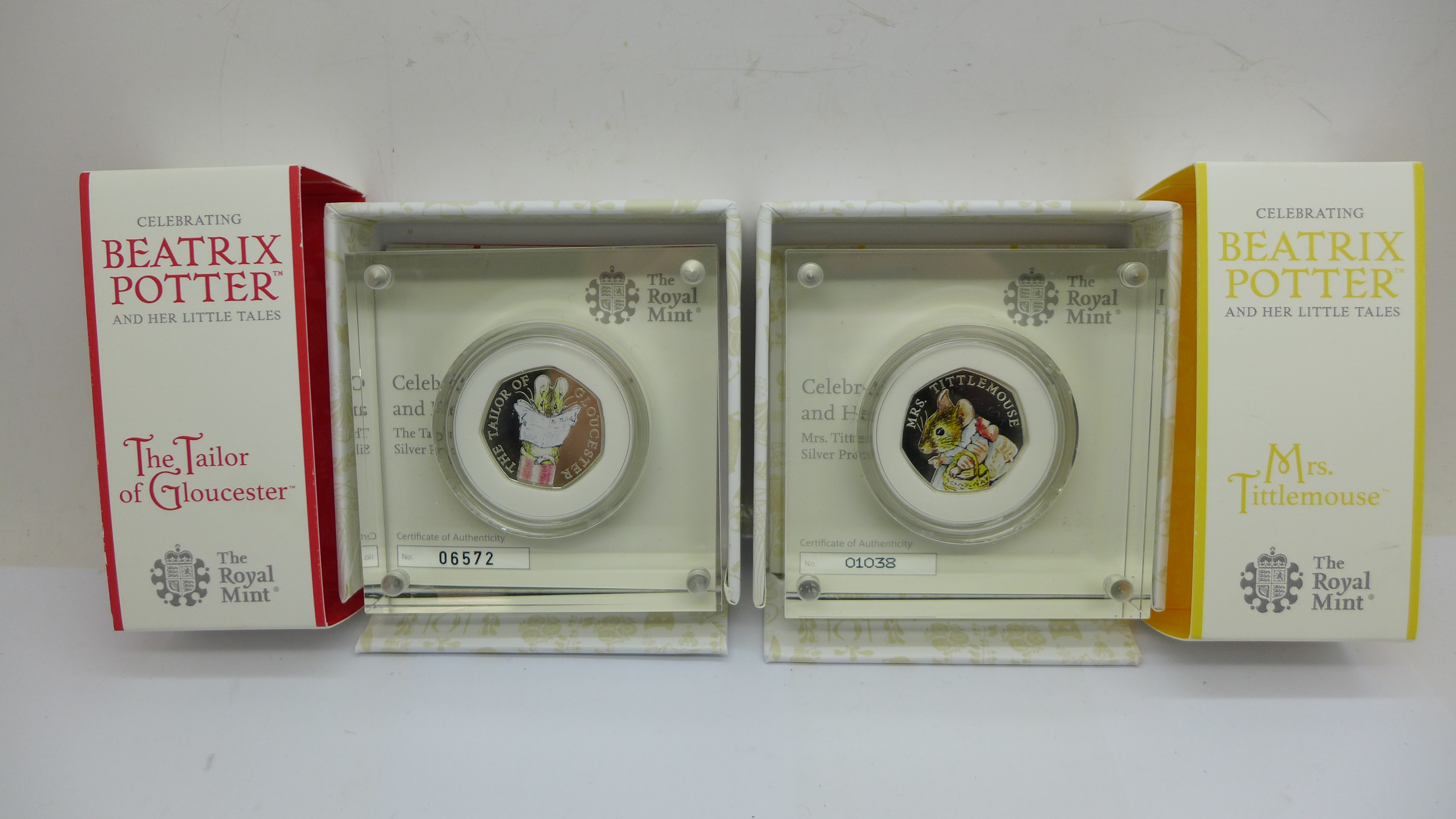 Two Beatrix Potter 50p silver coins, Mrs Tittlemouse and The Tailor of Gloucester, boxed