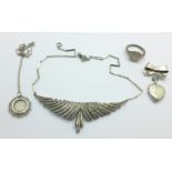 An Art Deco paste set necklet, a silver ring, a silver coin pendant and a silver heart shaped brooch