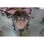 A Chippendale Revival carved mahogany corner chair