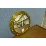 A small brass convex mirror