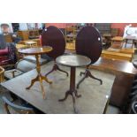 A pair of mahogany oval wine tables and two others