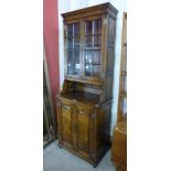 A George III style Ipswich oak bookcase