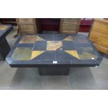 A South African Brutalist slate top and inlaid coffee table in the style of Paul Kingma
