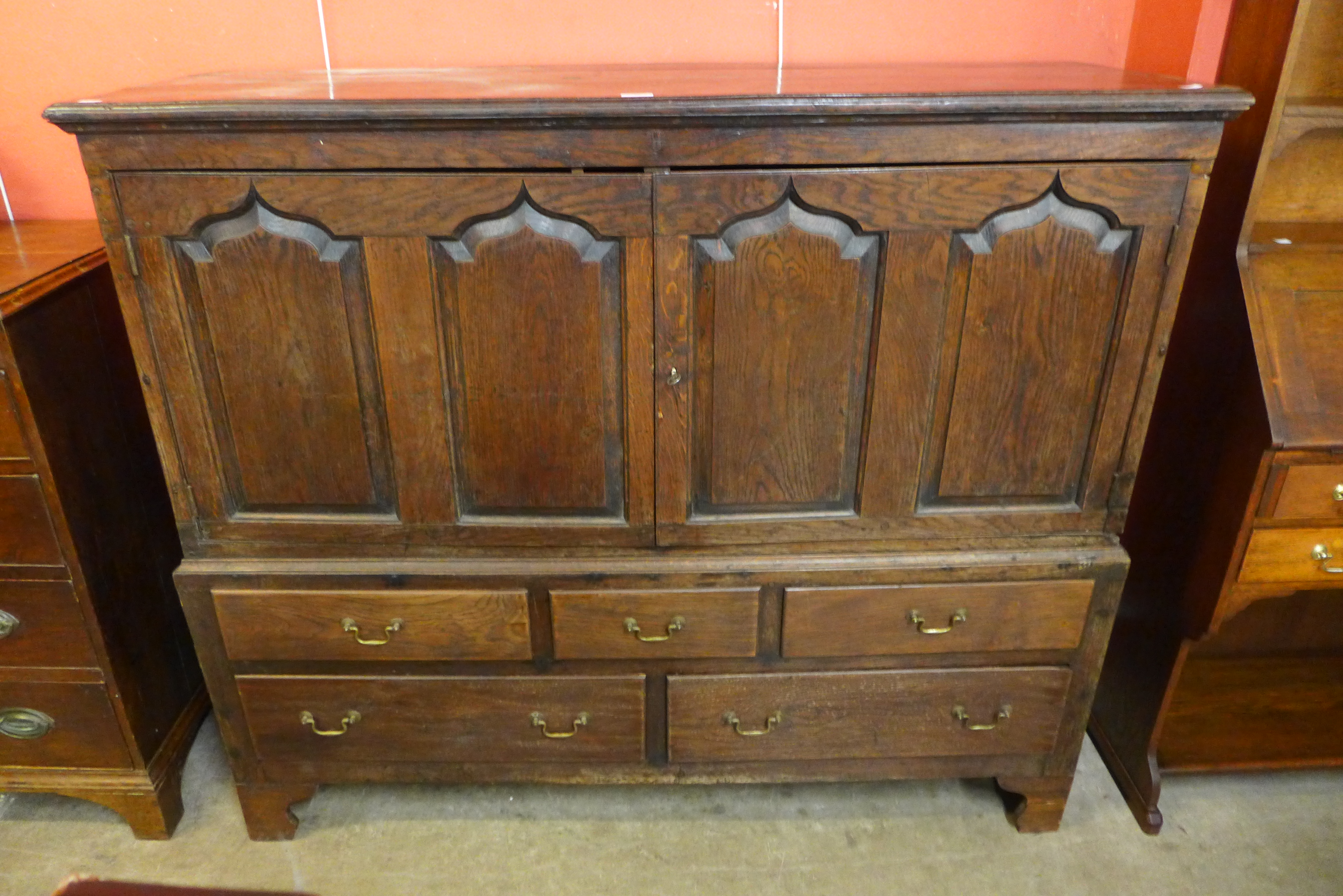 A George III oak housekeeper's cupboard