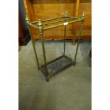 A Victorian cast iron and brass stick stand
