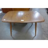 An Ercol Blonde elm and beech coffee table