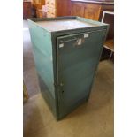 An industrial steel single door cabinet