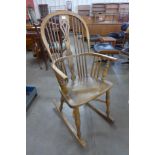 An elm Windsor rocking chair