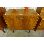 A walnut record cabinet