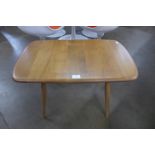 An Ercol Blonde elm and beech coffee table