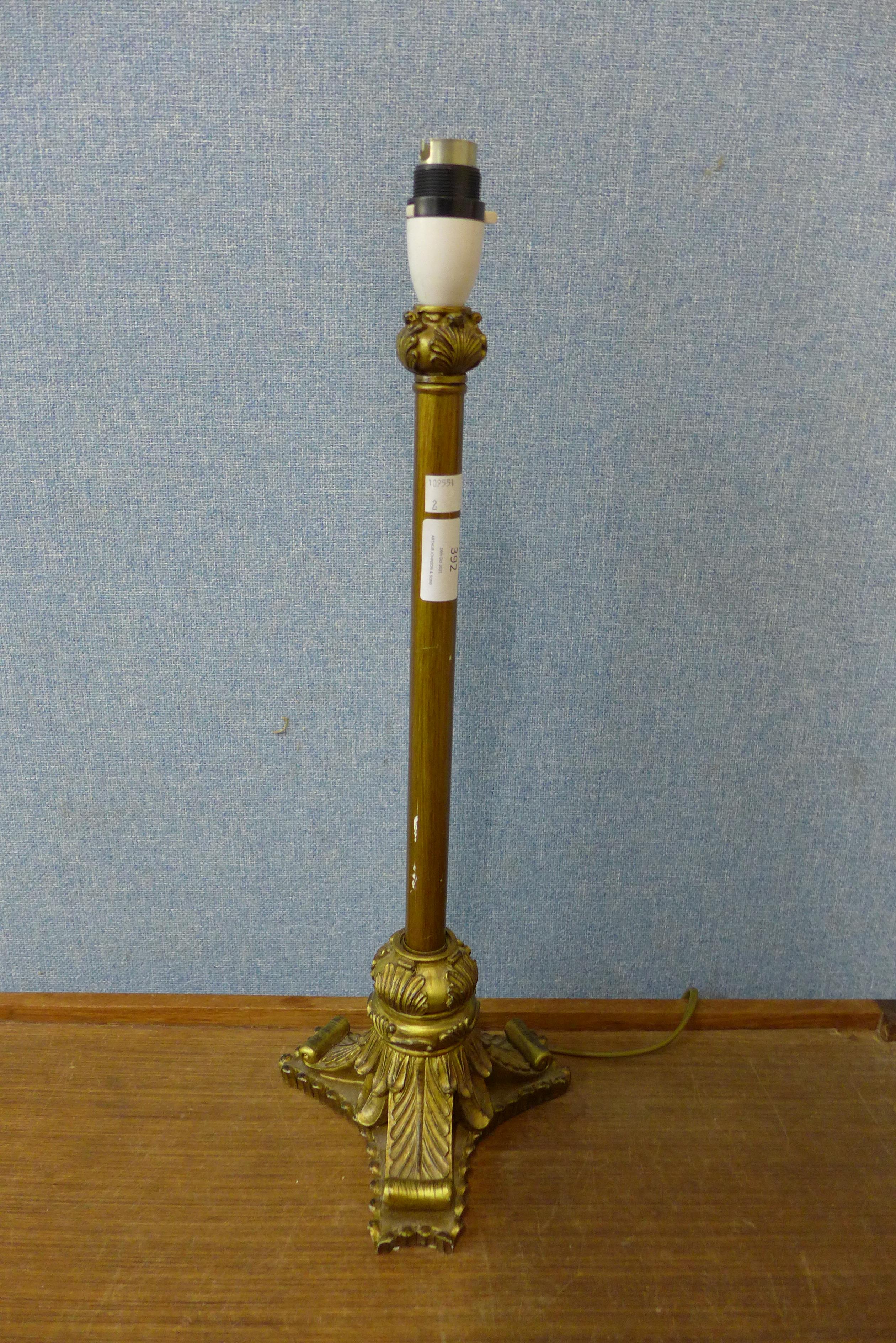 An Italian style gilt table lamp