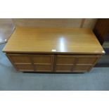 A Nathan teak two door cabinet