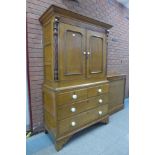 A George III oak and fruitwood housekeeper's cupboard