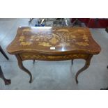 A Dutch mahogany and marquetry inlaid fold over card table