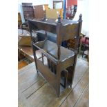 An oak newspaper stand/book rack