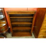 A Victorian walnut open bookcase