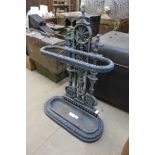 A cast iron stick stand