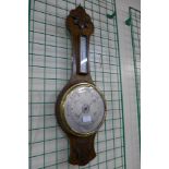 An oak aneroid banjo barometer