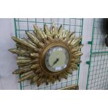 A Smiths sunburst wall clock