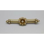 An early 20th Century yellow metal, pearl and diamond brooch, with a case, 3.7g