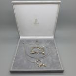 A designer silver necklace and charm bracelet hallmarked London 1963