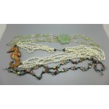 Two gemstone necklaces and a mother of pearl necklace