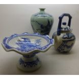 A Chinese blue and white teapot, vase and footed bowl