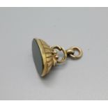 A hallmarked 9ct gold fob set with a blood stone, total weight 2.4g