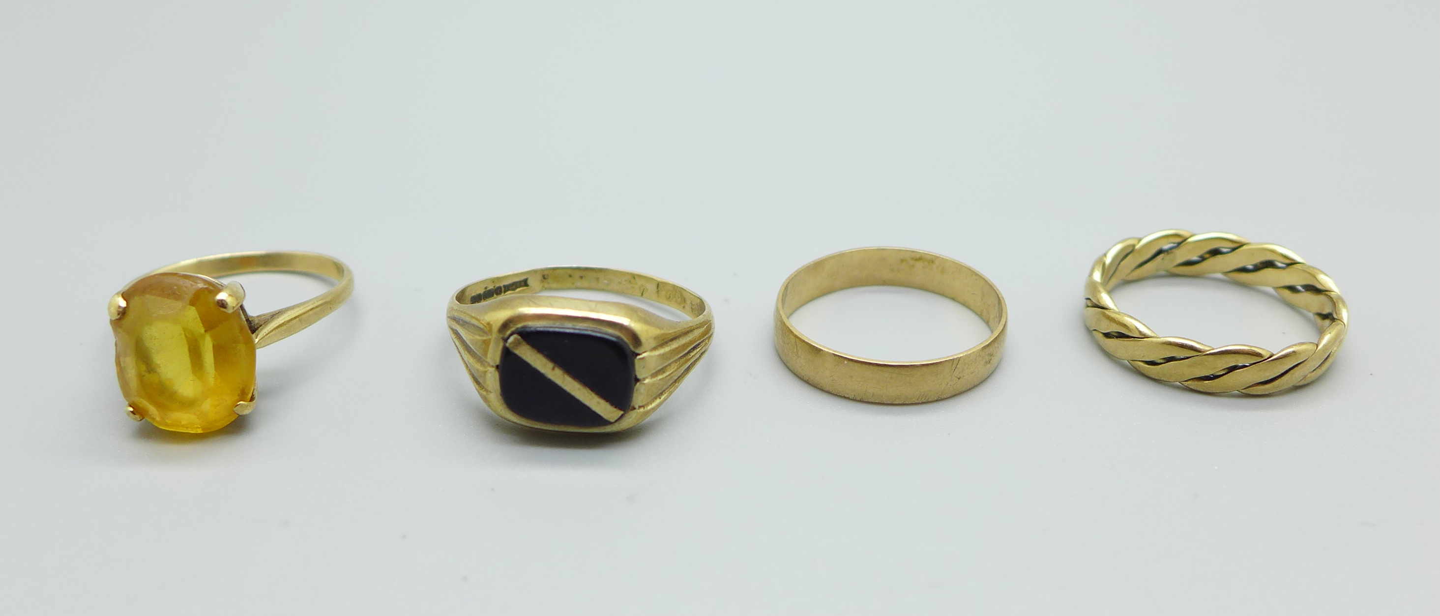 Four 9ct gold rings, total weight 9.5g