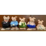 A set of five Wade Nat West pig money banks