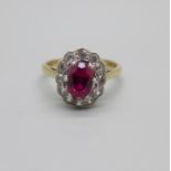 A 9ct gold, red and white stone cluster ring, 2.3g, L