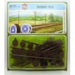 A 1973 trade pack of twelve OO/HO scale Airfix telegraph pole sets